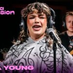 Watch Lola Young Cover The Cure’s “Close To Me”