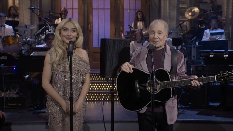 Watch Paul Simon & Sabrina Carpenter Perform “Homeward Bound” On SNL’s 50th Anniversary Special