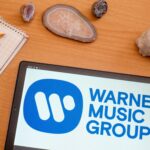 Warner Joins Forces With AI Song Generator, Suno, That It Was Suing