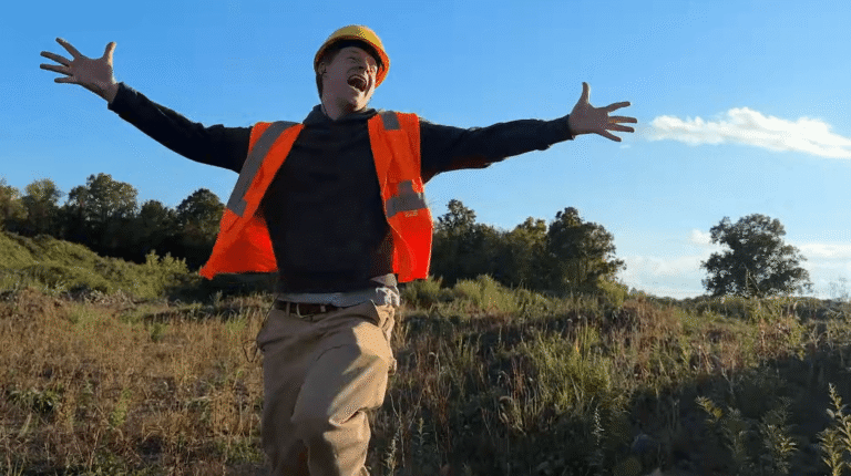 Cameron Winter Makes Lucas Hedges Direct Traffic in “Love Takes Miles” Video