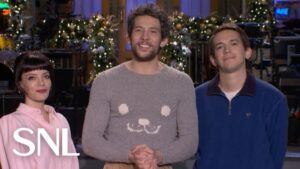 Lily Allen Jokes With Josh O’Connor In SNL Promo, Gets A West End Girl Puffer From Jimmy Fallon