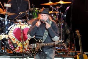 Neil Young Addresses Minneapolis ICE Shooting In Op-Eds: “Wake Up People!”